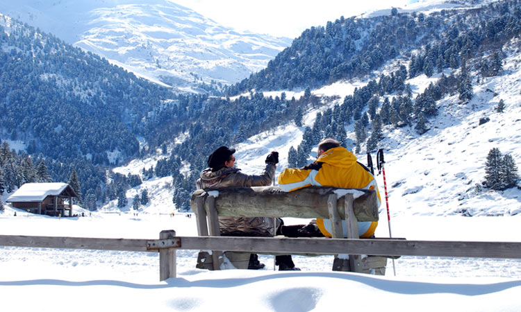 Couple in Meribel snowy moutains