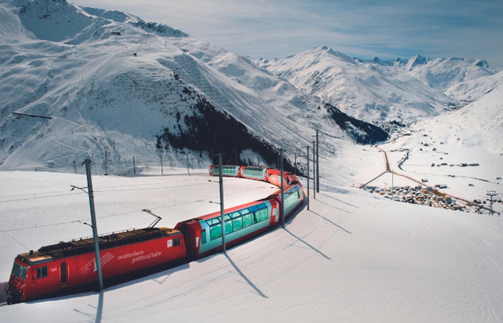 A train traveling through the Swiss Alps